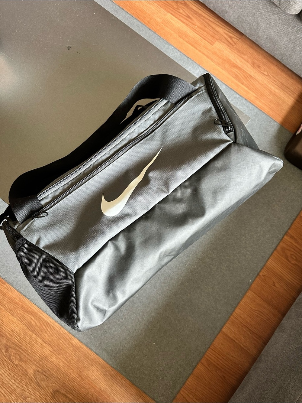 Nike Gray Duffel Bag with White Swoosh